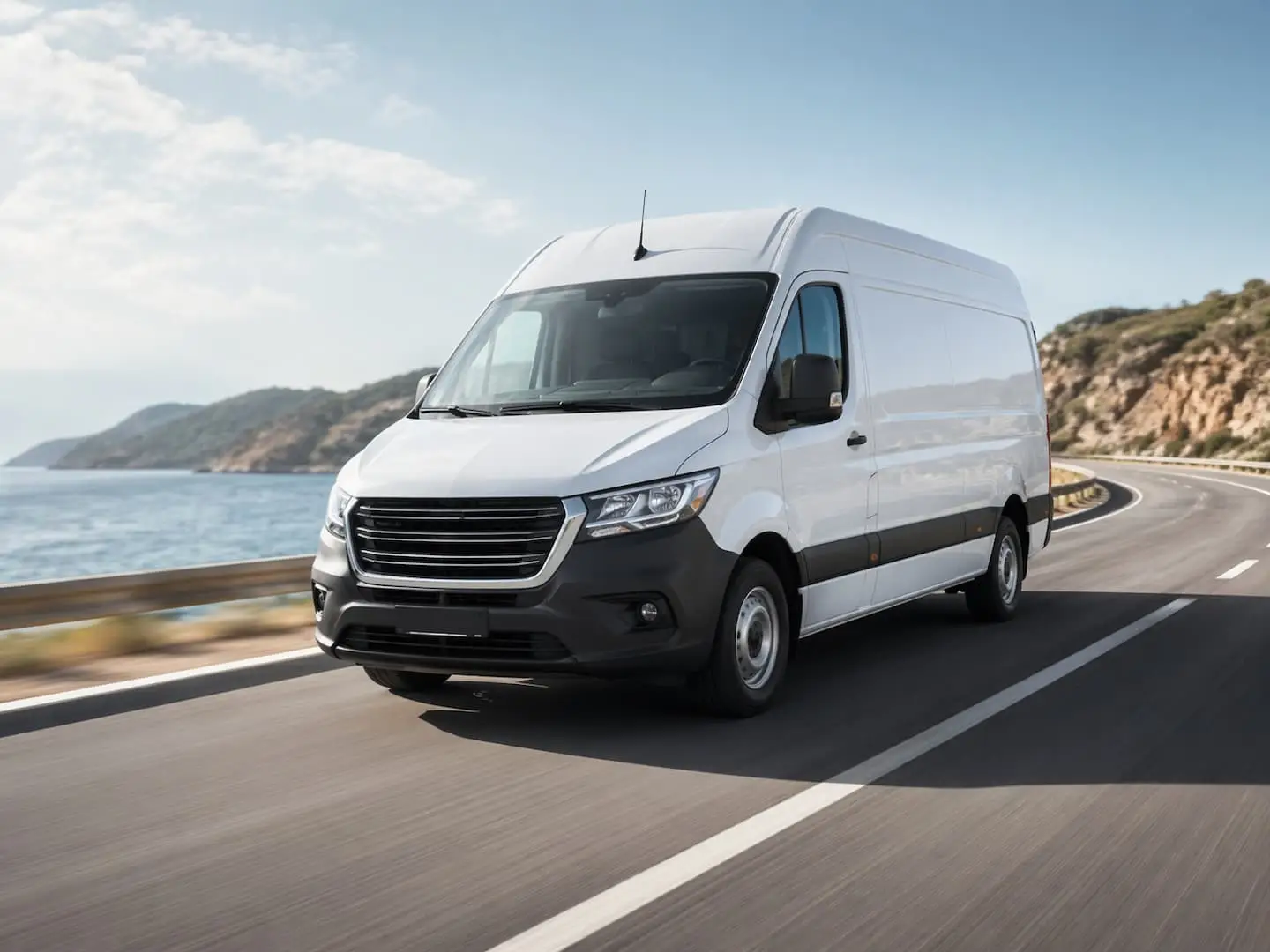 Modern rental van driving on an open road for a van rental software website