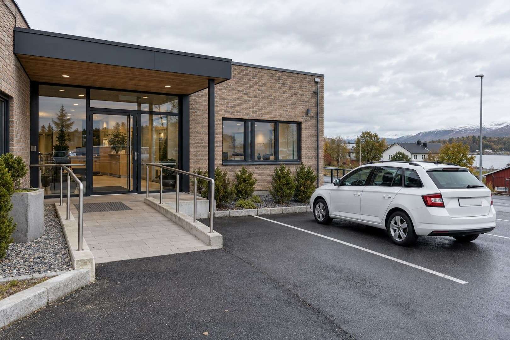 Street-level approach to a small rental office with a clear pedestrian entrance