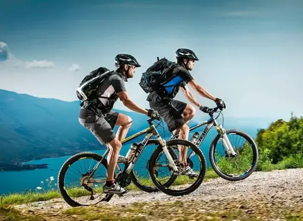 Tourists on bicycles in the mountains